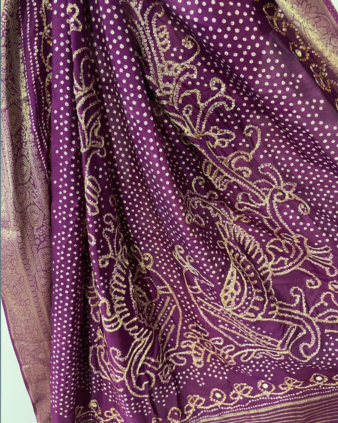 Pure banarasi munga silk bandhej saree in hand dabka work and peacock motifs