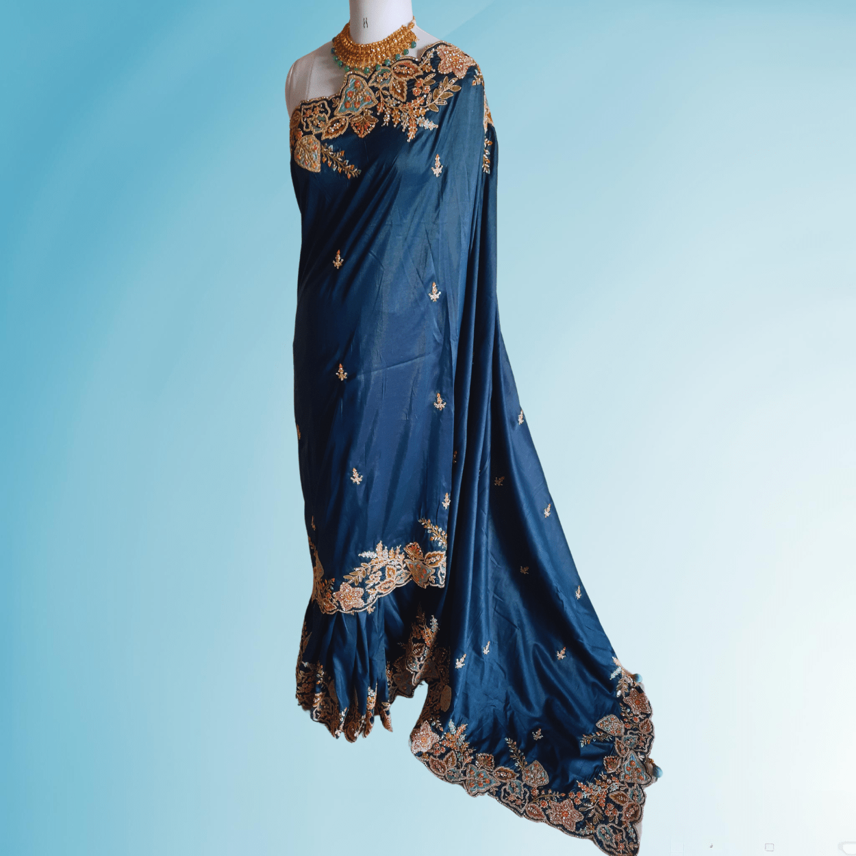 Pure chinnon crepe silk saree in resham dori hand embroidery in peacock blue color - Kalyanam By Swati