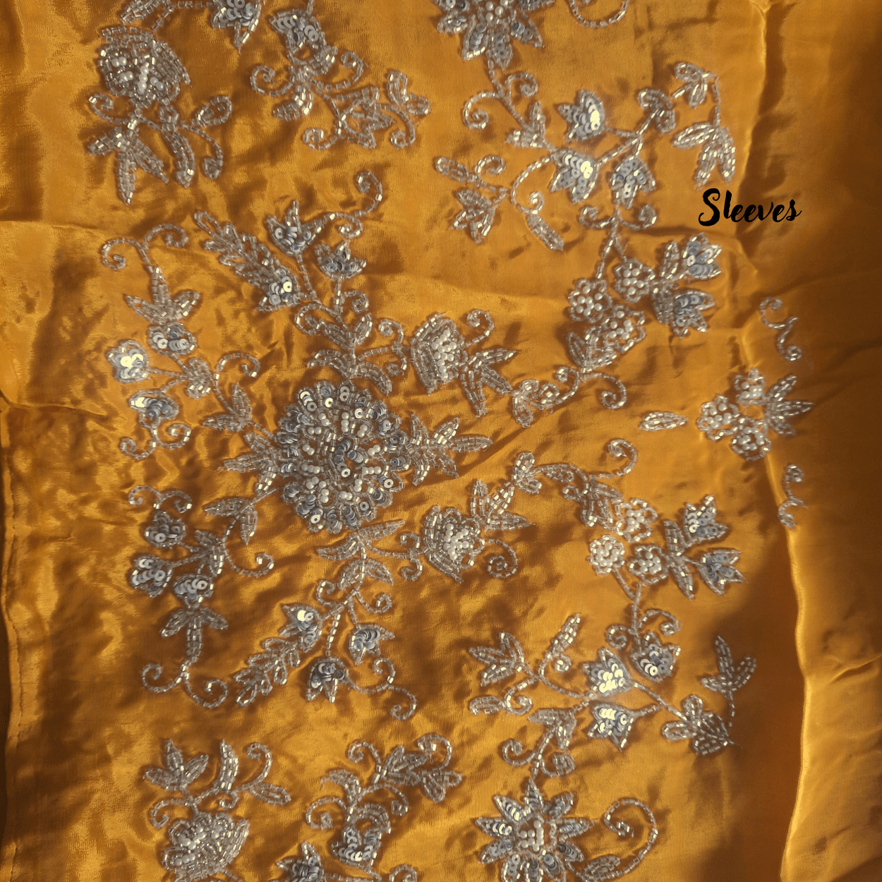 Pure crepe satin silk saree in silver cutdana, pearls and sequins handwork in purple color - Kalyanam By Swati